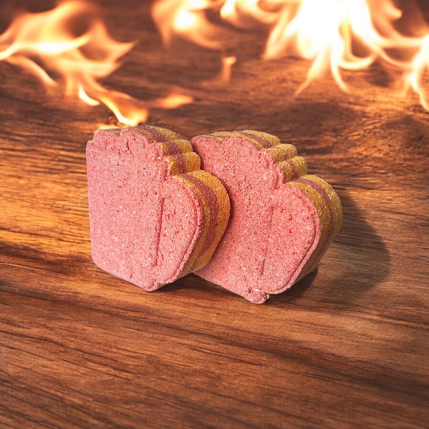 A handmade, hot chocolate scented, mug shaped, red coloured bath bomb