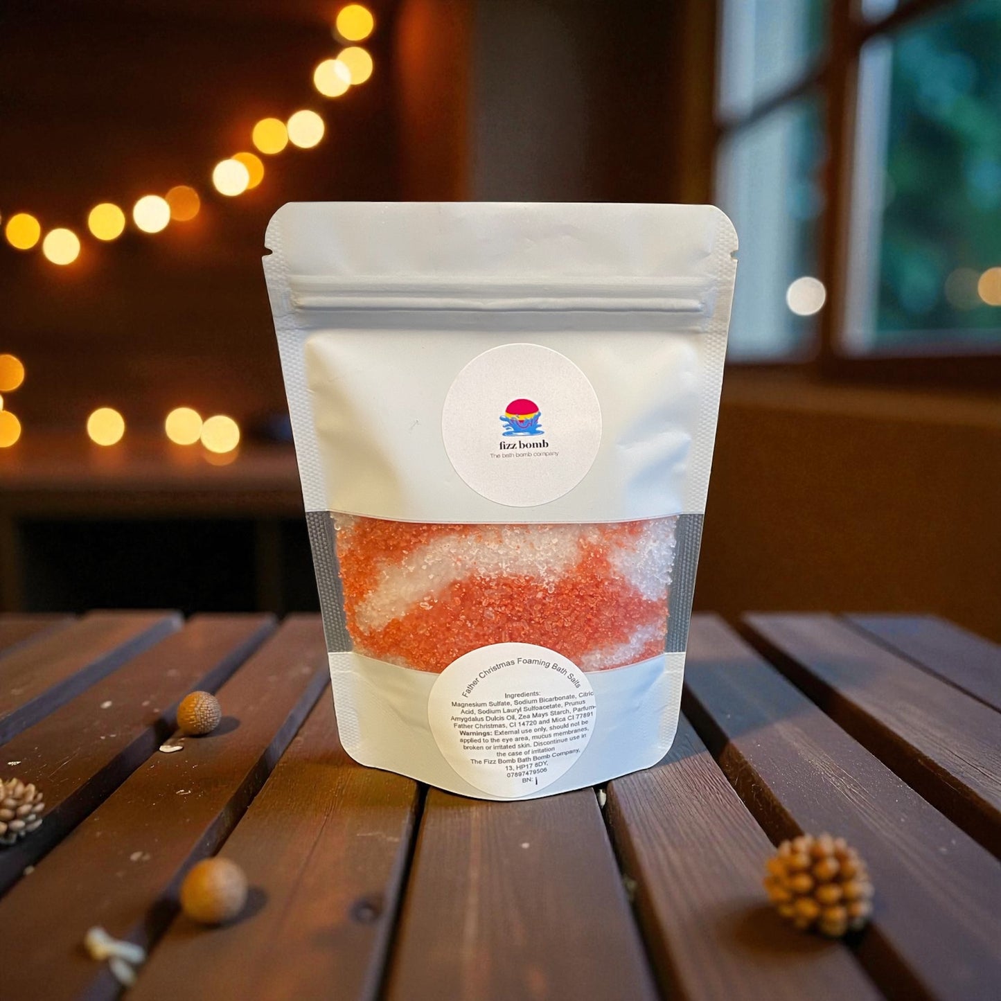 Packaged product on a wooden surface with blurred lights in the background