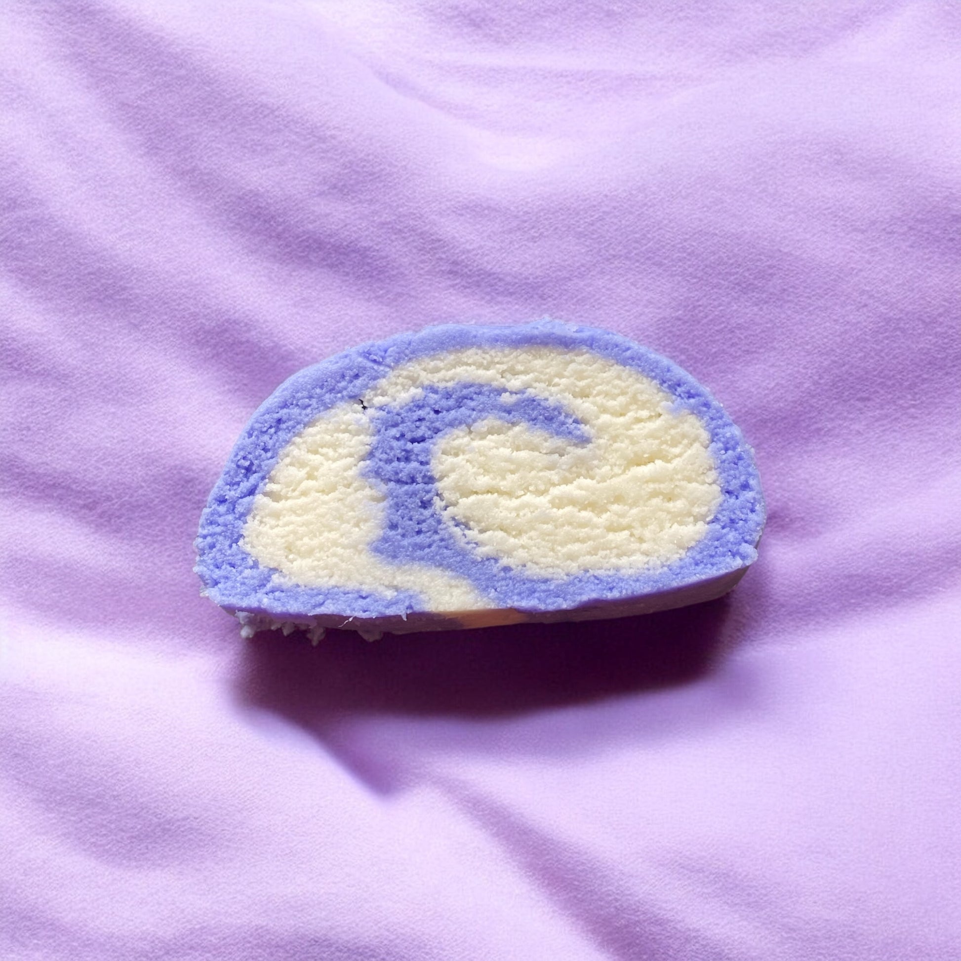 A purple and white swirl bubble bar with a lavender coloured background