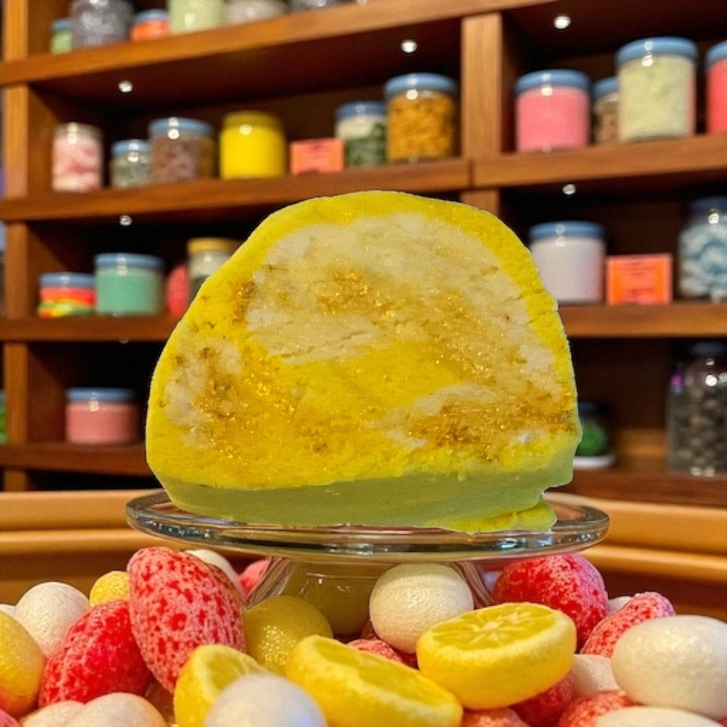 A sherbet lemon yellow and white bubble bar with a sweet shop background