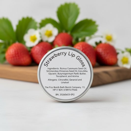 Strawberry lip gloss with ingredients list on a white background